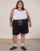 Sam is 5'10" and wearing 2XL Heavyweight Sweat Shorts in Basic Black paired with a Cropped Tank in Vintage Tee Off-White