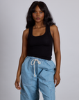 Kandia is 5’4” and wearing P The Tank Top in Basic Black