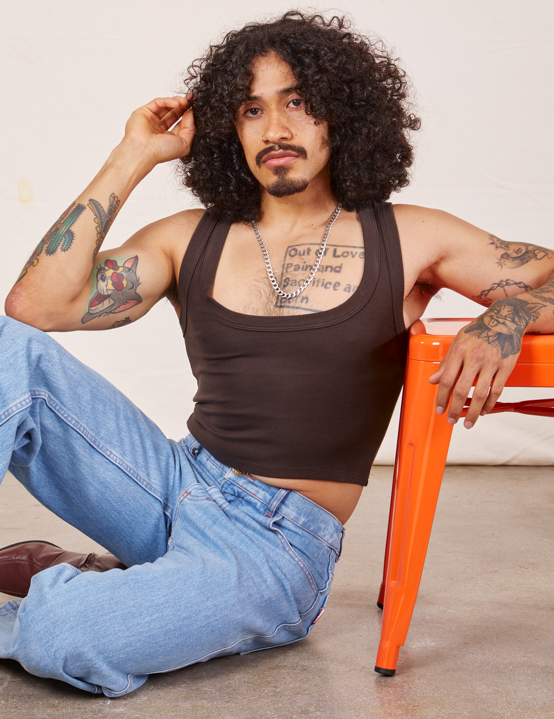 Jesse is 5'8" and wearing XS Cropped Tank Top in Espresso Brown