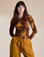 Alex is 5’8” and wearing P Long Sleeve Baby Tee in Honey Brown