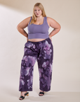 Juliet is 5'7" and wearing 1XL Magic Waters Drop Pocket Pants in Dark Lavender paired with faded grape Cropped Tank