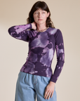 Alex is 5’8” and wearing P Long Sleeve Baby Tee in Dark Lavender