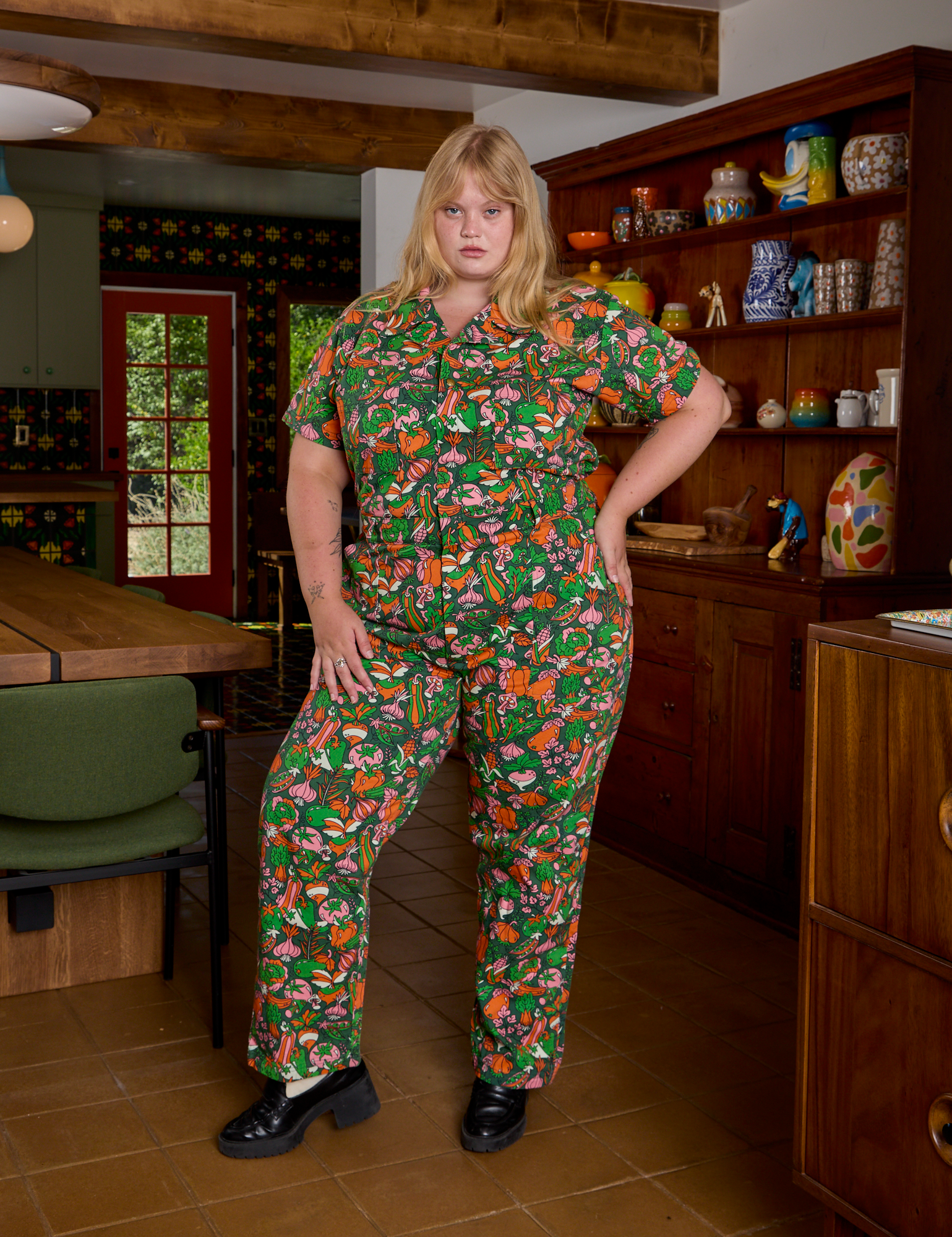 Juliet is 5'7" and wearing 1XL Short Sleeve Jumpsuit in Kitchen Collection