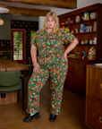 Juliet is 5'7" and wearing 1XL Short Sleeve Jumpsuit in Kitchen Collection