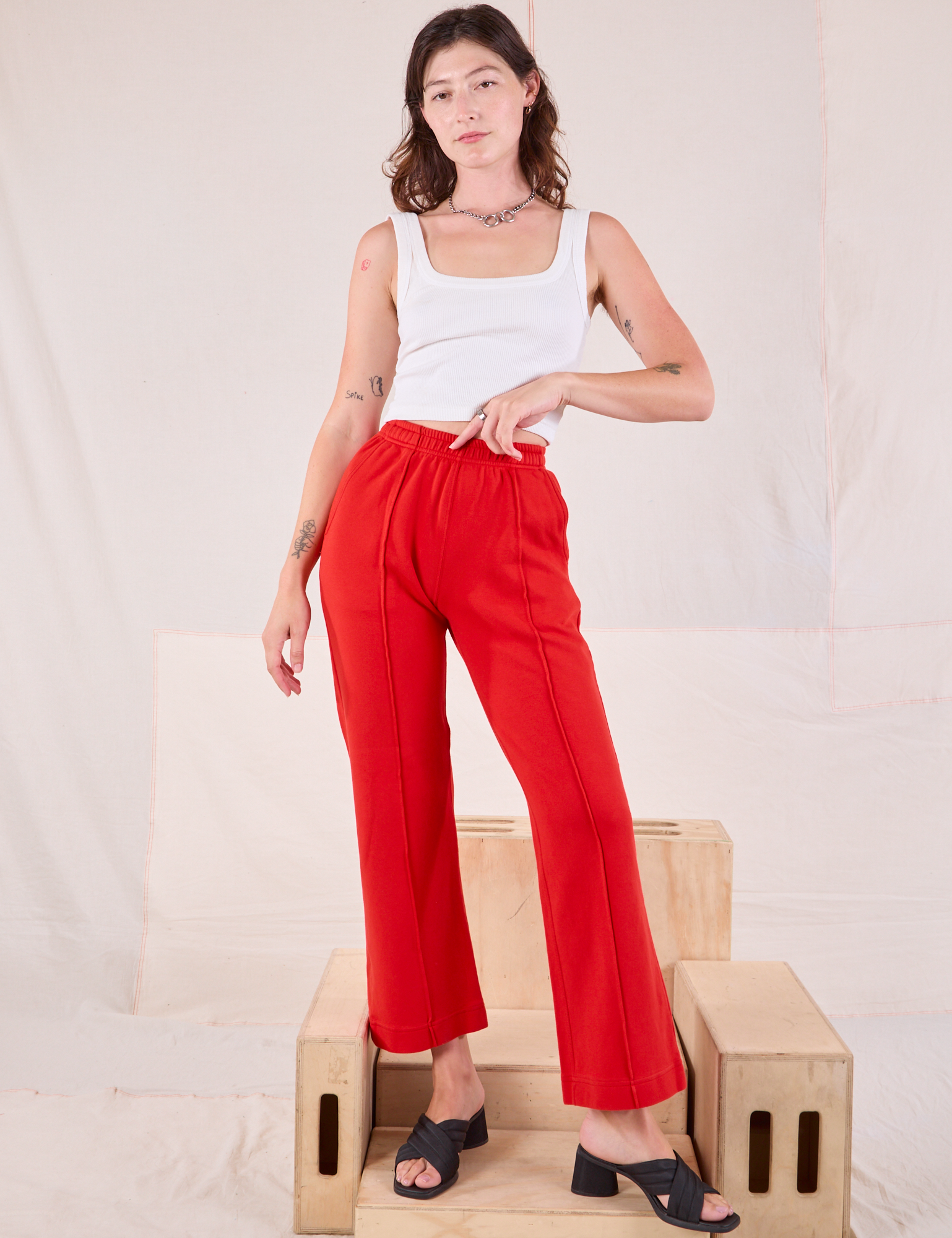 Alex is 5'8" and wearing P Easy Western Pants in Mustang Red