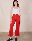 Alex is 5'8" and wearing XS Western Pants in Mustang Red paired with a Cami in Vintage Tee Off-White