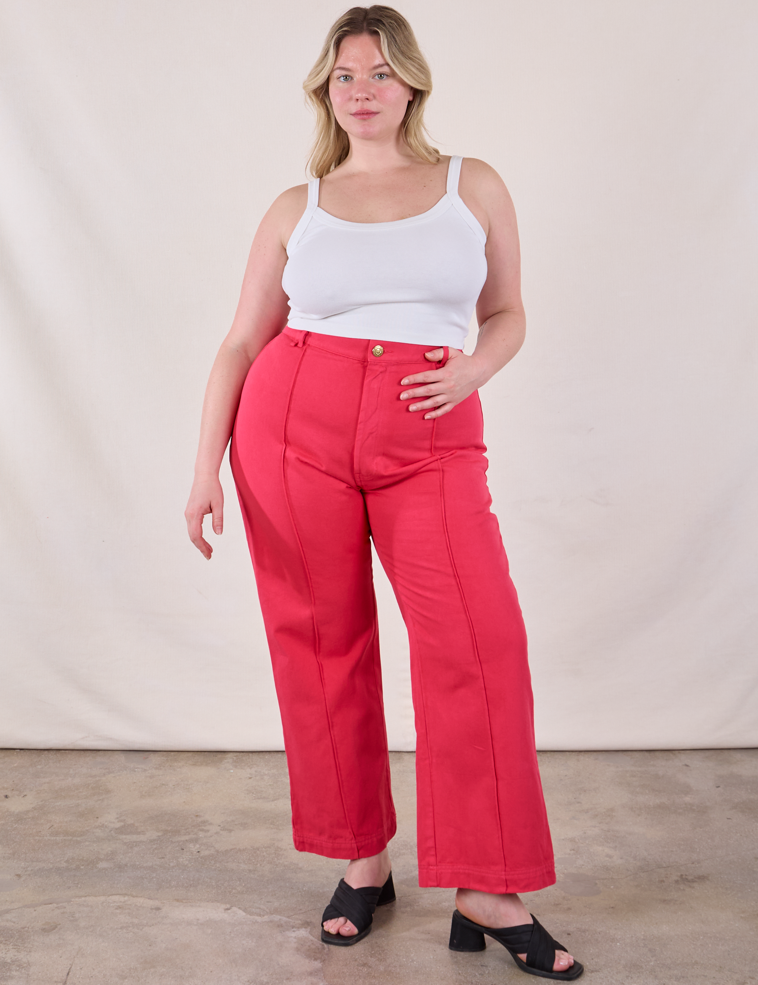 Lish is 5'8" and wearing XL Western Pants in Hot Pink paired with a Cropped Cami in Vintage Tee Off-White