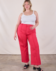 Lish is 5'8" and wearing XL Western Pants in Hot Pink paired with a Cropped Cami in Vintage Tee Off-White