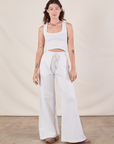 Alex is 5'8" and wearing P Wide Leg Sweat Pants in Vintage Tee Off-White paired with Cropped Tank