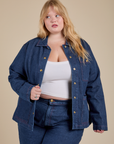 Juliet is 5'8" and wearing L Indigo Denim Work Jacket in Dark Wash