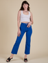 Alex is 5’8” and wearing XS Work Pants in Royal Blue paired with a vintage tee white Cropped Tank