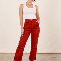 Soraya is 5'2" and wearing Petite XXS Work Pants in Paprika paired with vintage off-white Tank Top