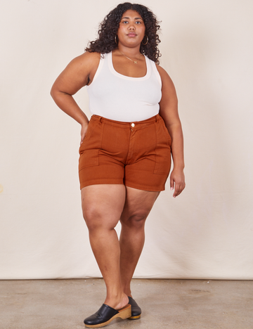 Morgan is 5'5" and wearing 1XL Classic Work Shorts in Burnt Terracotta paired with vintage off-white Tank Top
