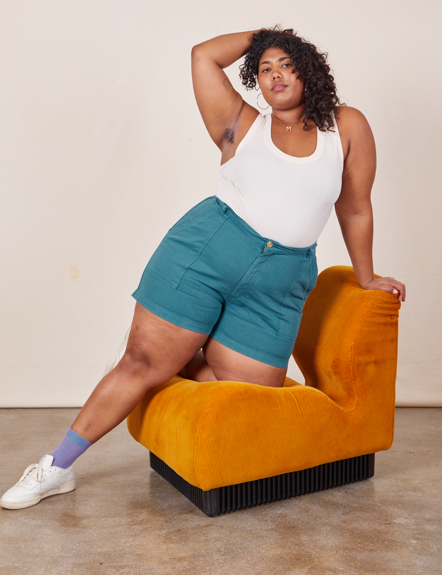Morgan is 5'5" and wearing size 1XL Classic Work Shorts in Marine Blue paired with vintage off-white Tank Top