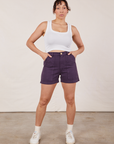 Tiara is 5’4” and wearing S Classic Work Shorts in Nebula Purple paired with Cropped Tank Top in vintage tee off-white