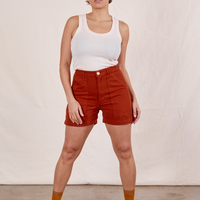 Tiara is 5'4" and wearing size S Classic Work Shorts in Paprika paired with vintage off-white Tank Top