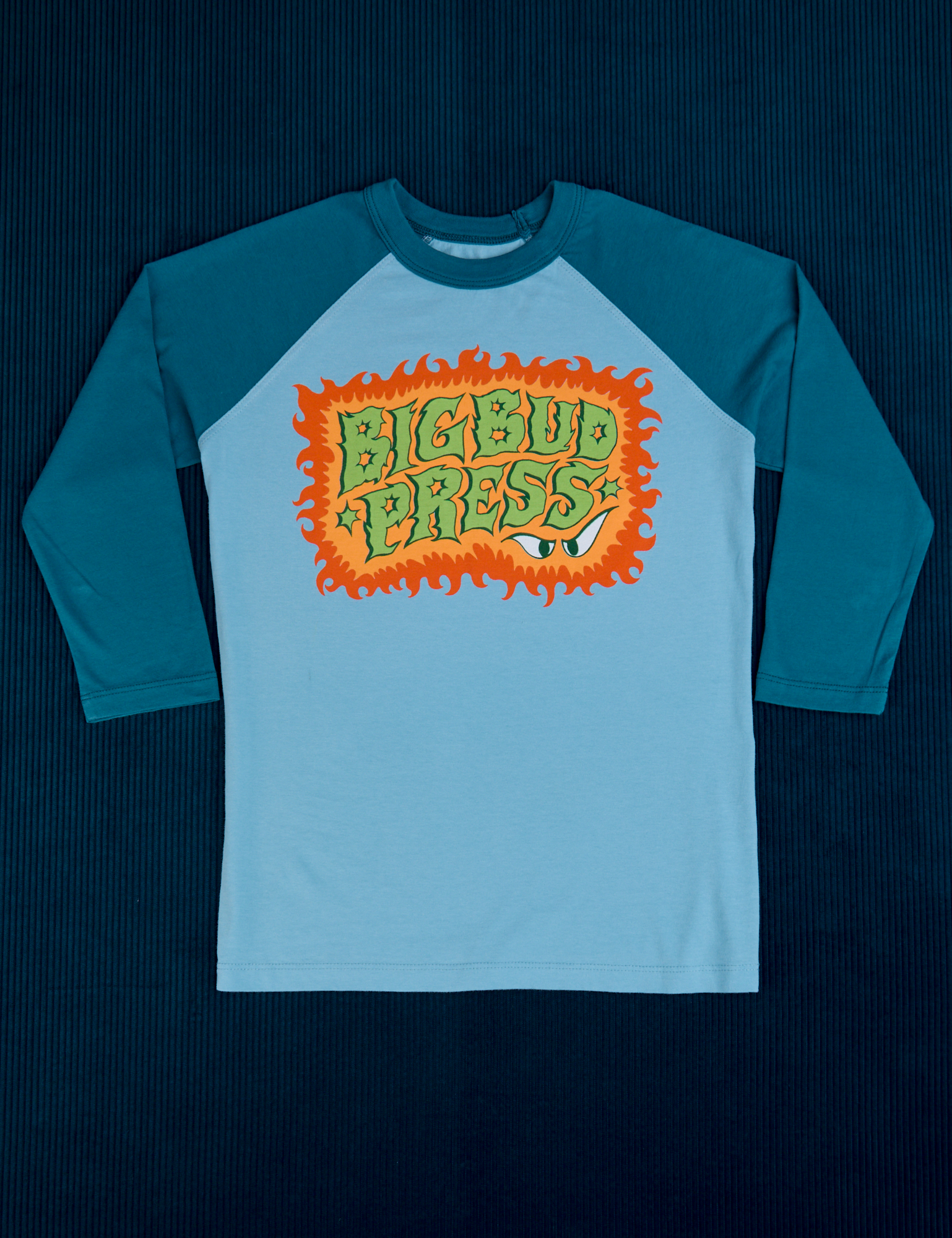 Raglan Tee in Haunted BBP. Light blue tee body with marine blue 3/4 sleeves