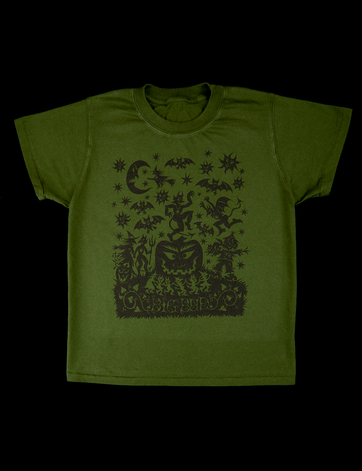 Vintage Tee in Papercut. Green shirt body with black graphic of pumpkin, devils, a witch, scarecrow bats and the moon.