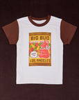 Vintage Tee in Gummy Bear. White tee body with fudgesicle brown sleeves. Graphic of Big Bud bag of gummy bears on shirt. 