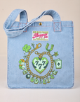 Shopper Tote in Lucky Charm - Screenprinted charm bracelet with a clover, horseshoe, dice, Ace, and Good Luck.