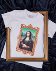 Masters Organic Tee in Mona Lisa centered in a gold ornate frame