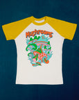 White body with yellow sleeves. Mushroom graphic at center of tee.