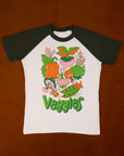 White body tee with dark green sleeves. Graphic of an array of veggies in the middle of the tee.