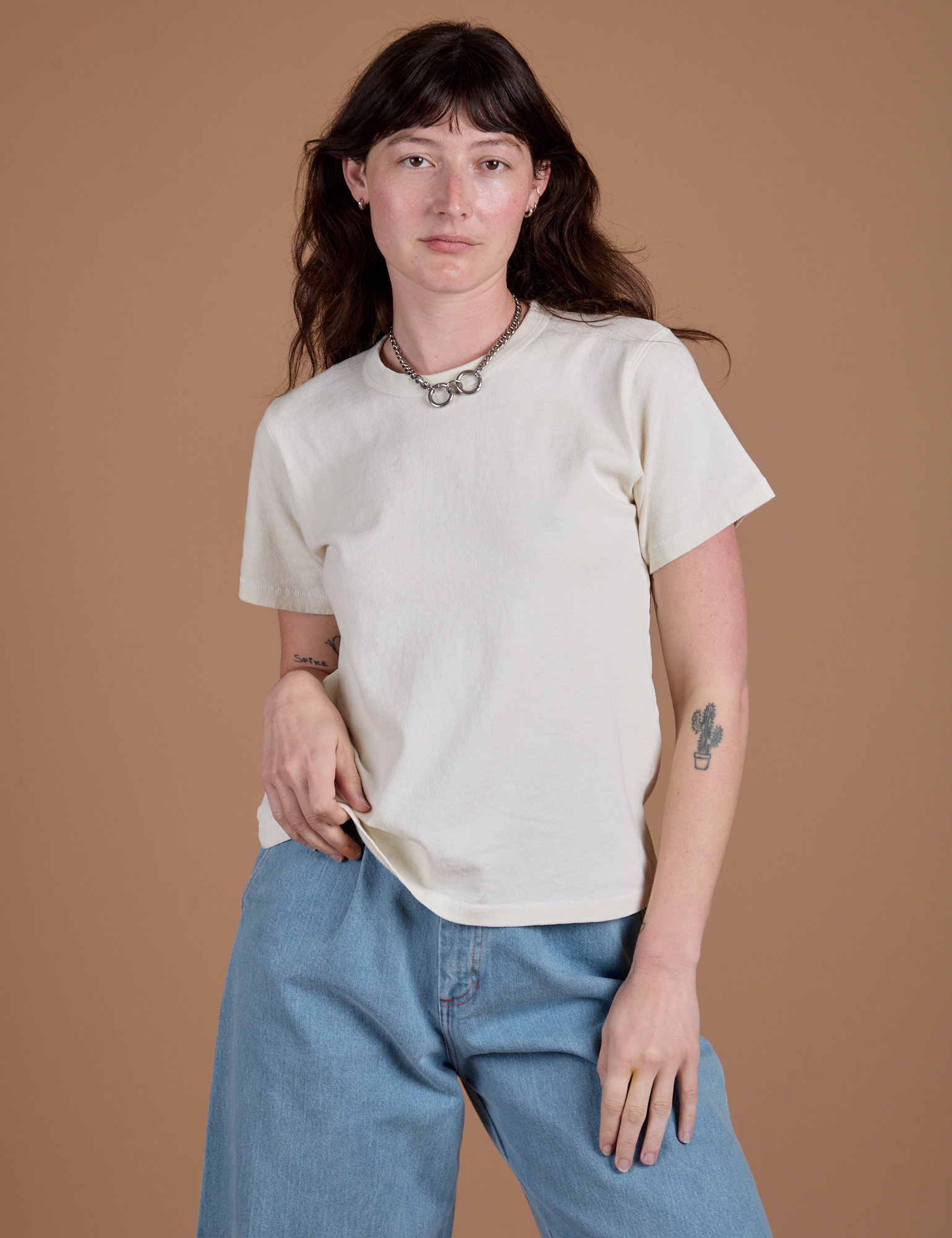 Alex is 5'8" and wearing P Burly Tee in Vintage Tee White