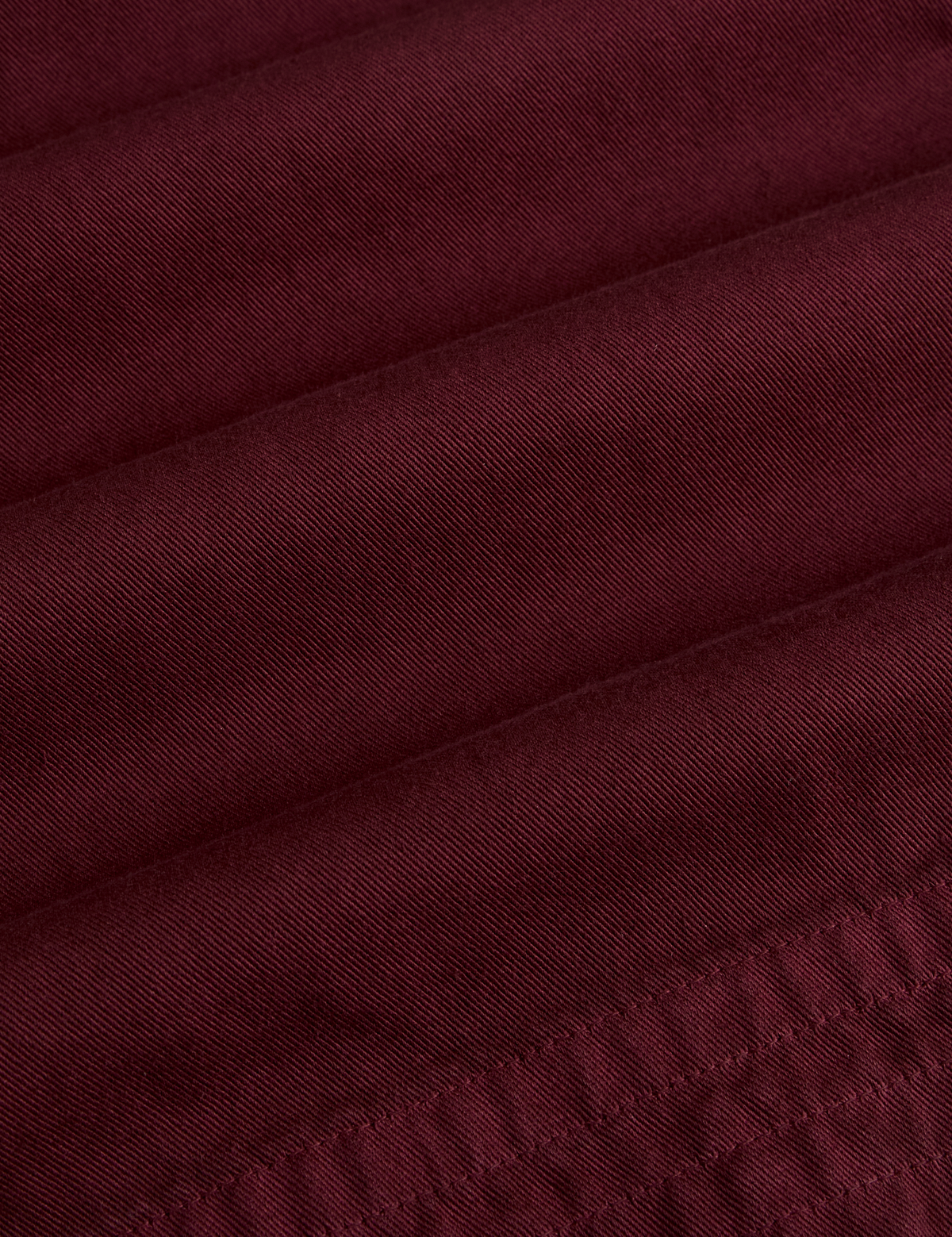Fabric close up of the Red Wine Action Pant