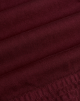 Fabric close up of the Red Wine Action Pant