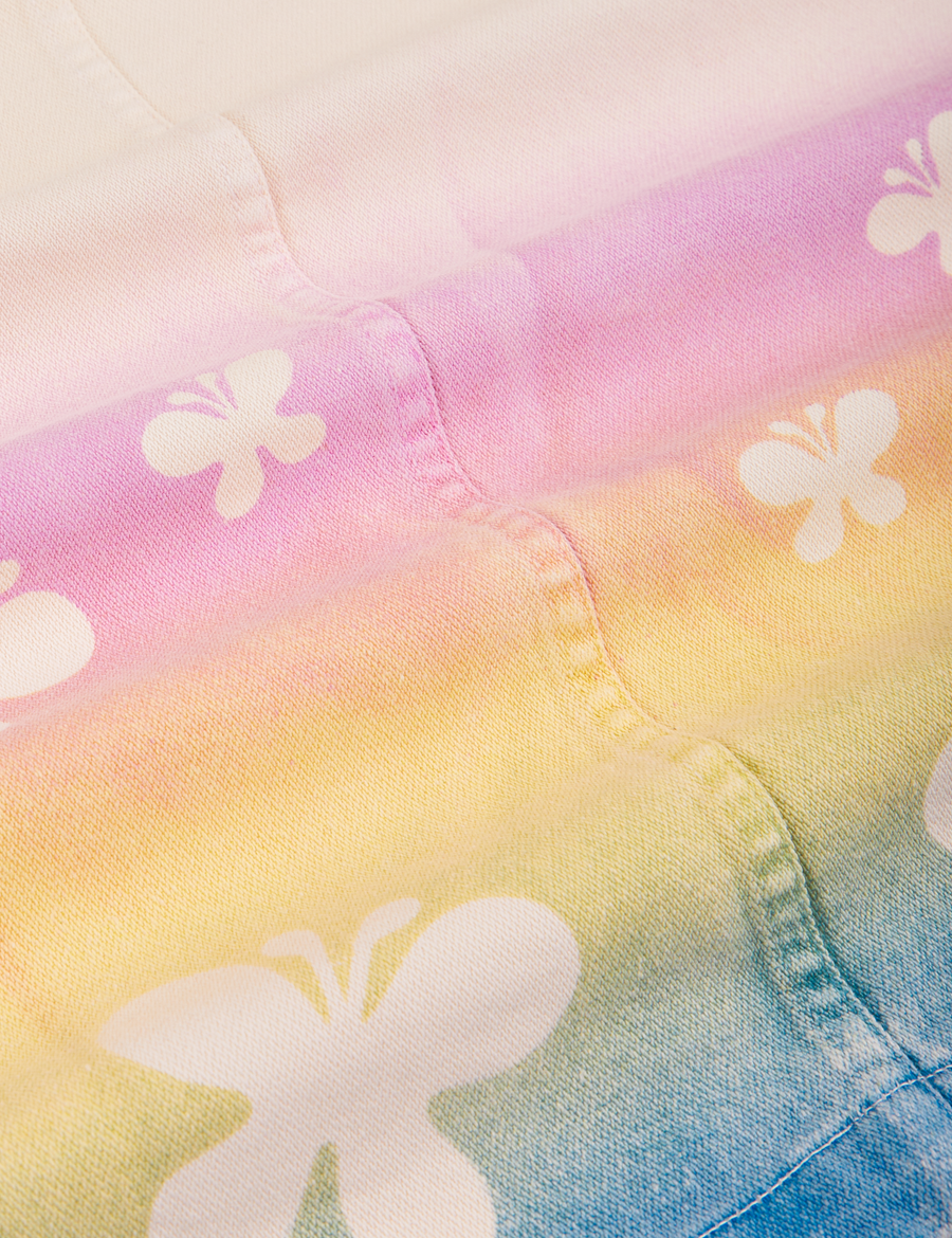 Close up of Work Jacket in Butterfly Airbrush. Gradient airbrush in pink, yellow and blue with butterfly silhouettes 