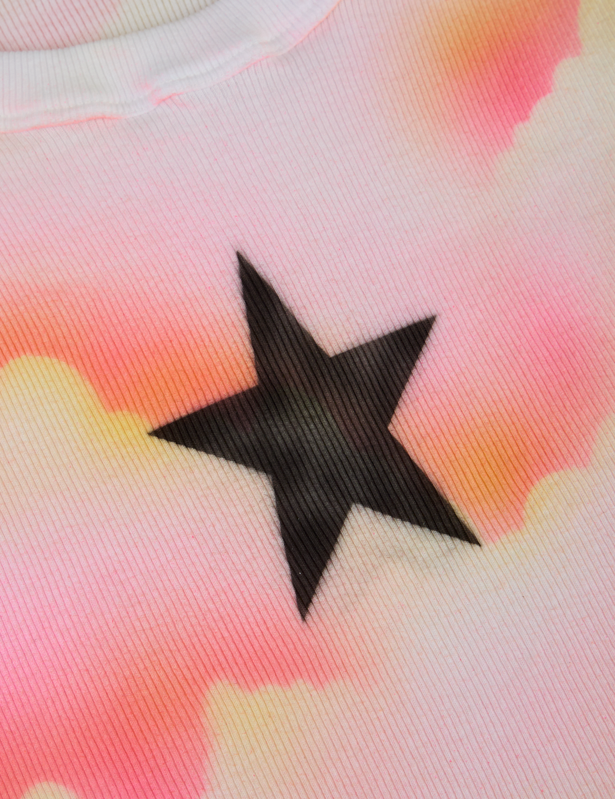 Fabric detail close up of the Black Star Airbrush Muscle Tee