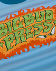 Close up of screenprinted Big Bud Press in green text surrounded by an orange firey border.