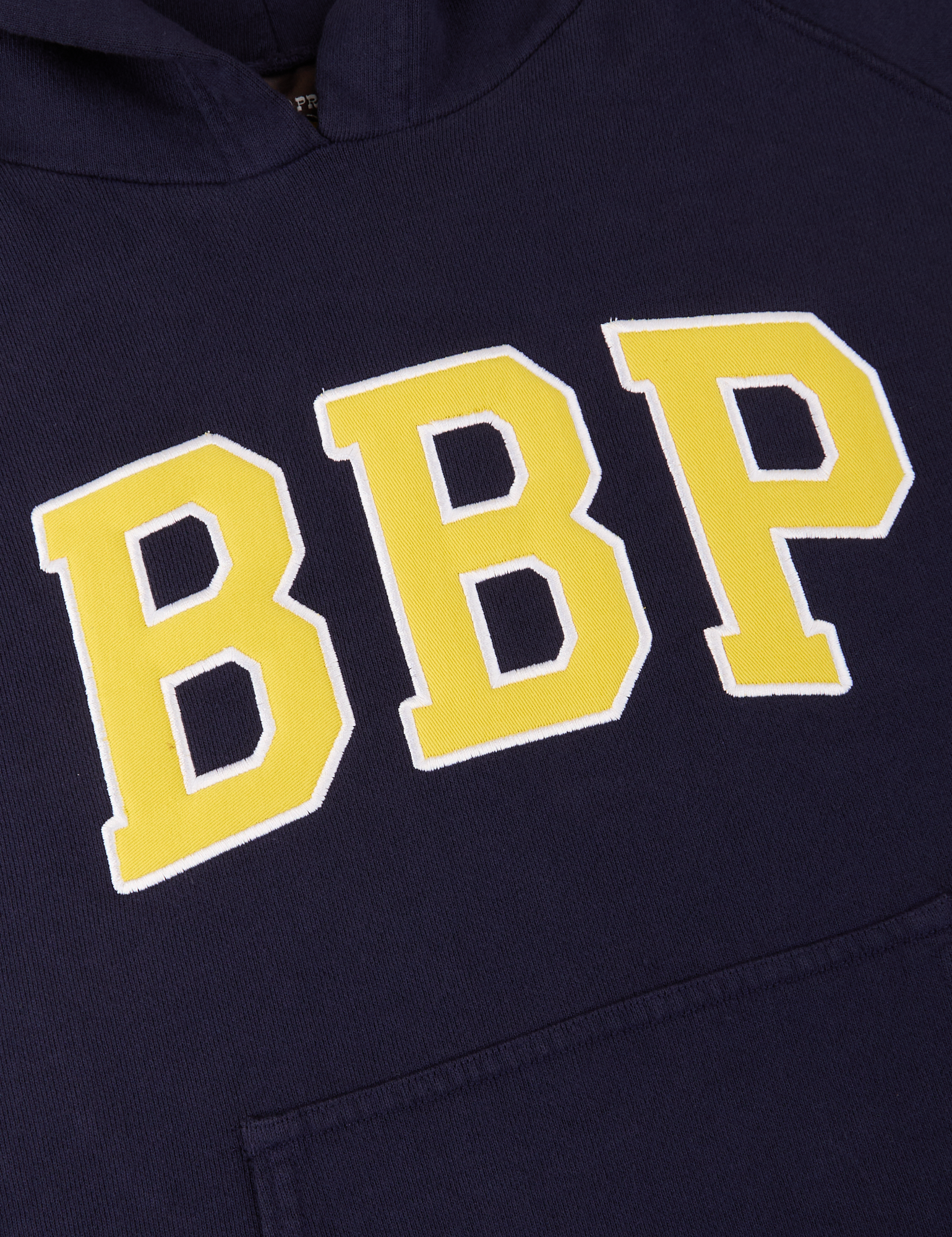 Collegiate Hoodie in Navy Blue close up of embroidered BBP in yellow with a white border