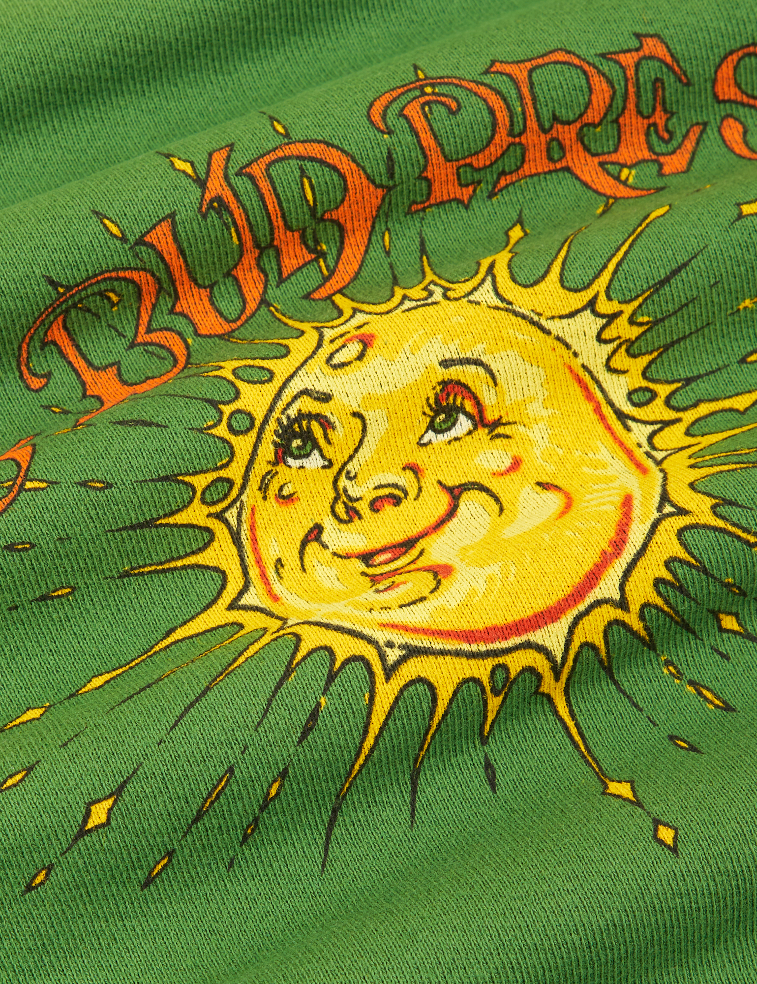 Bill Ogden's Sun Baby Crew in Lawn Green fabric close up