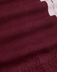 Painted Action Pants in Red Wine fabric detail close up