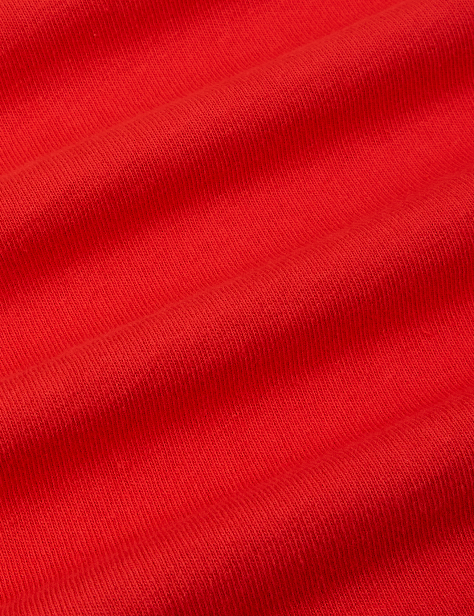 Burly Tee in Mustang Red fabric detail close up