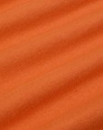 Burly Tee in Construction Orange fabric detail close up