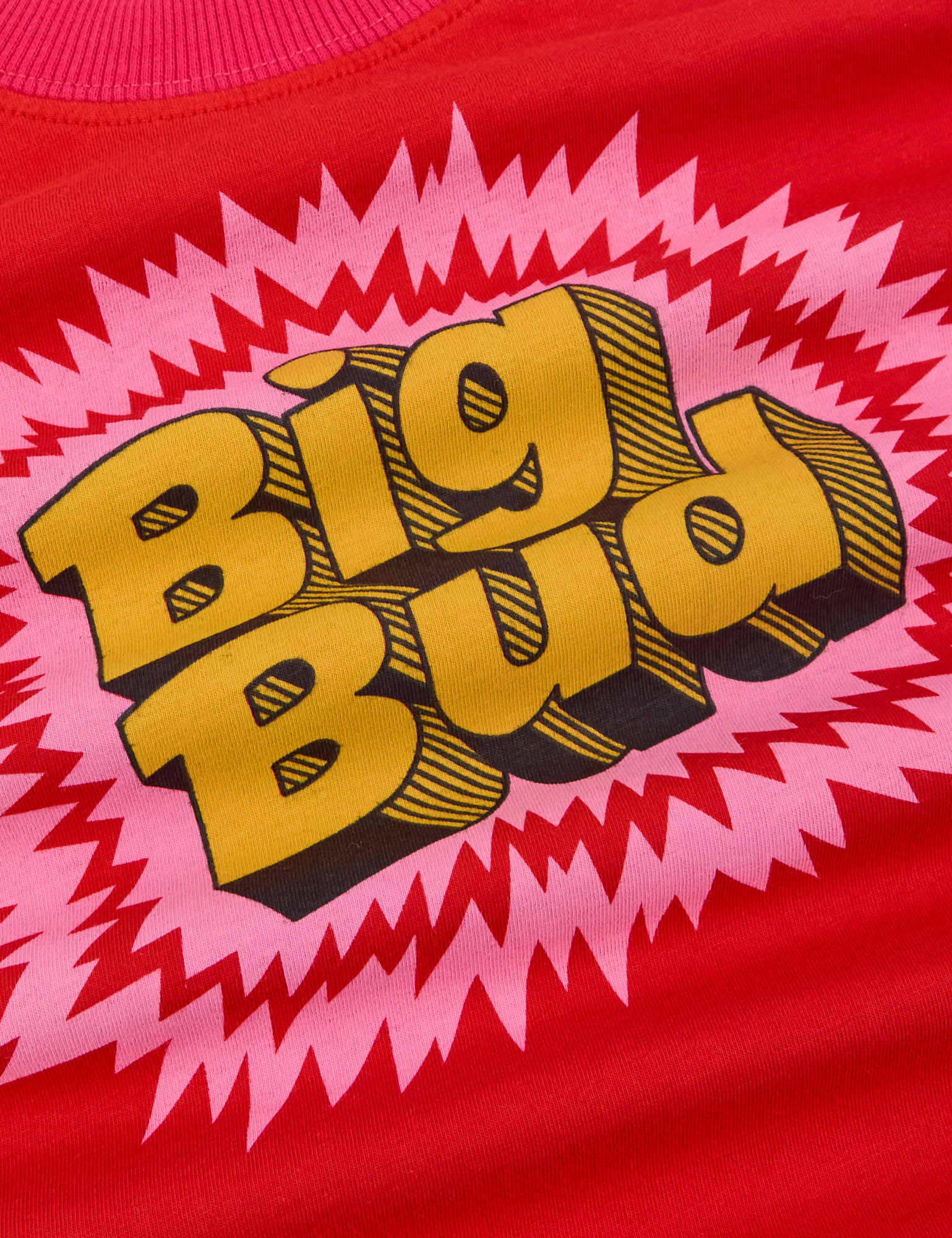 Vintage Tee in Pop Rocks Explosion close up of Big Bud text in yellow 
