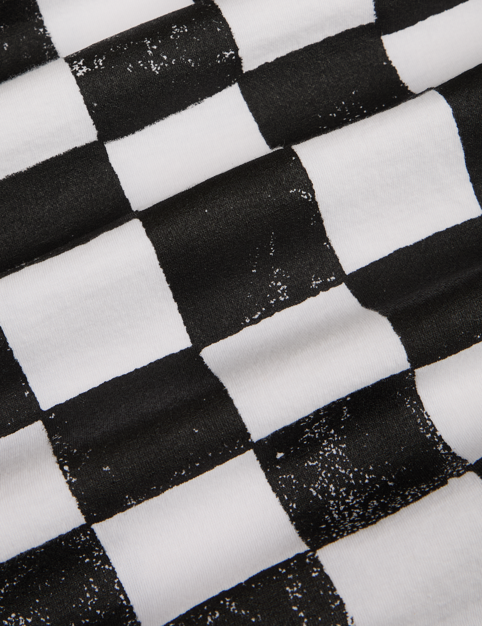 Fabric detail close up of black and white checkerboard print