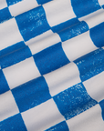 Fabric detail close up of blue and white checkerboard print