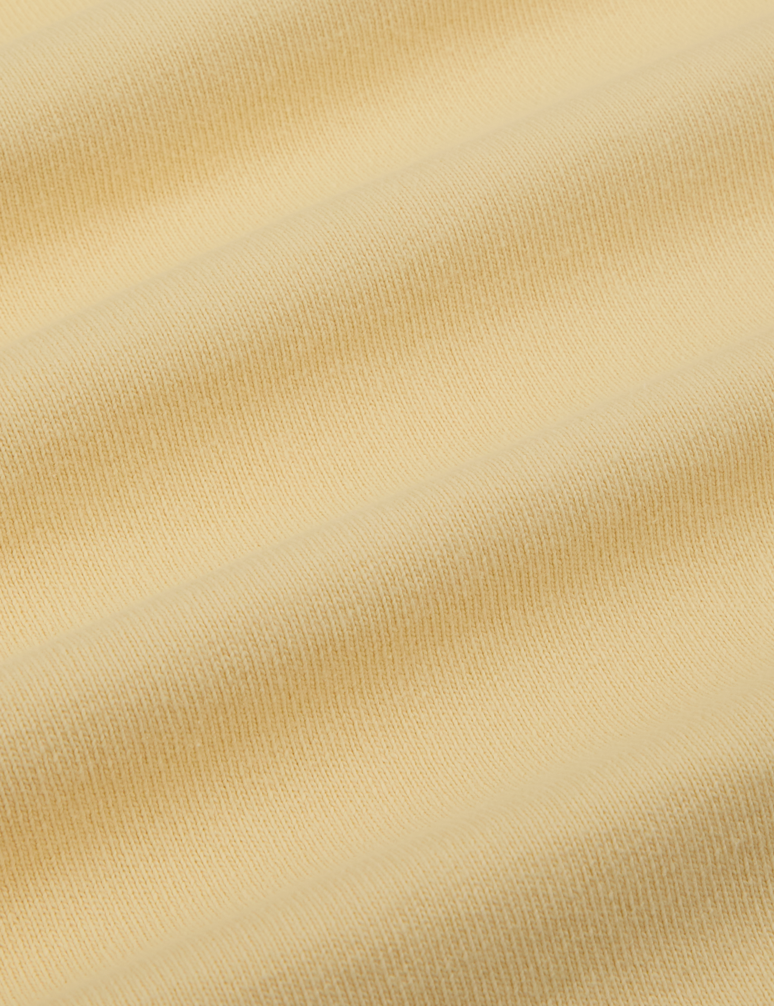 Cropped Burly Tee in Butter Yellow fabric detail close up