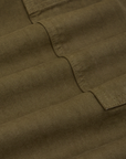Drop Pocket Cargo Pants in Surplus Green fabric detail close up