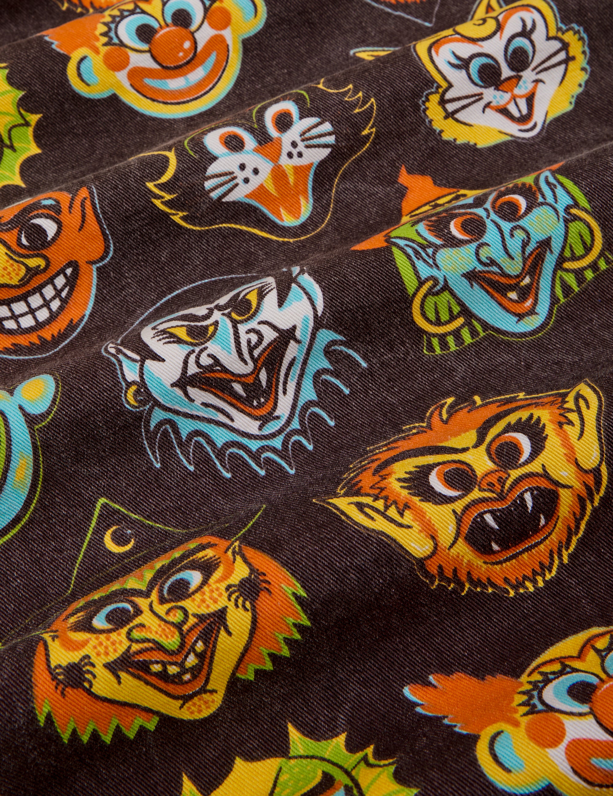 Short Sleeve Jumpsuit in Halloween Masks close up