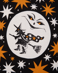 Halloween Organic Tee in Moon close up. White moon with a flying witch. Orange and white stars surround the image.