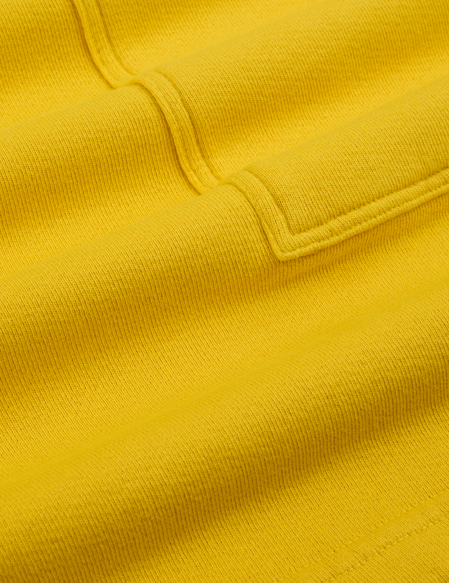 Heavyweight Sweat Shorts in Golden Yellow fabric detail close up