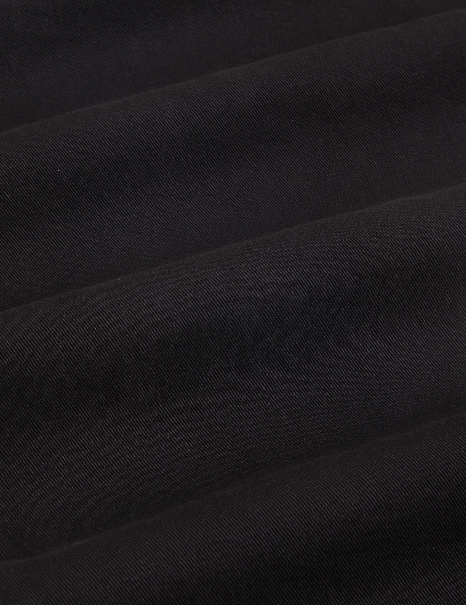 Heavyweight Trousers in Basic Black fabric detail close up.