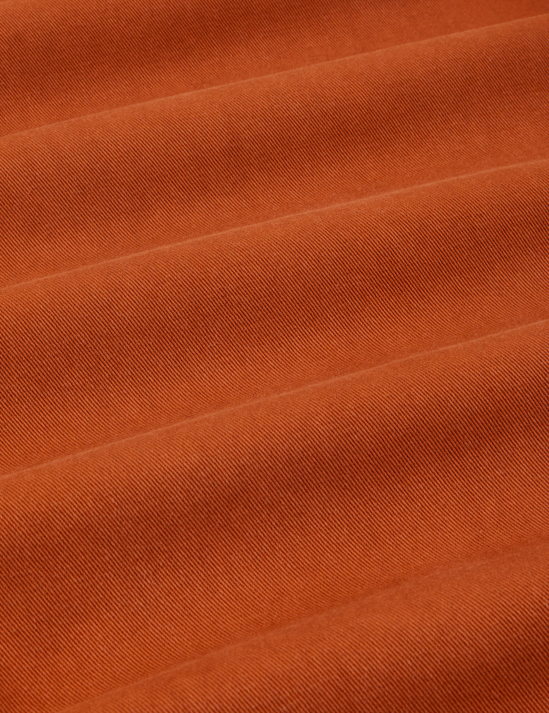 Heavyweight Trousers in Burnt Terracotta fabric detail close up