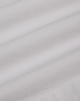 Pleated Trouser Shorts in Dishwater White fabric detail close up
