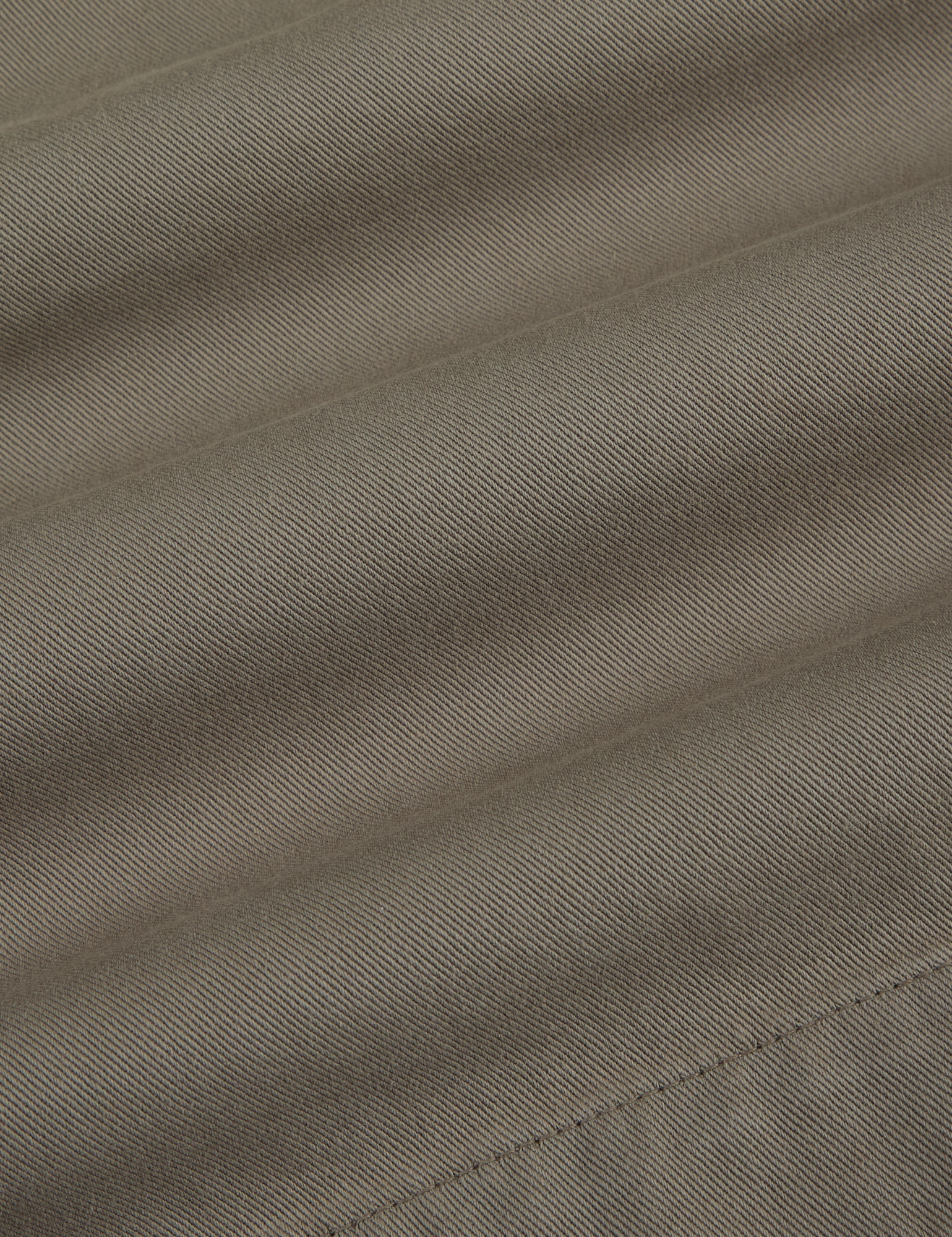 Pleated Trouser Shorts in Khaki Grey fabric detail close up